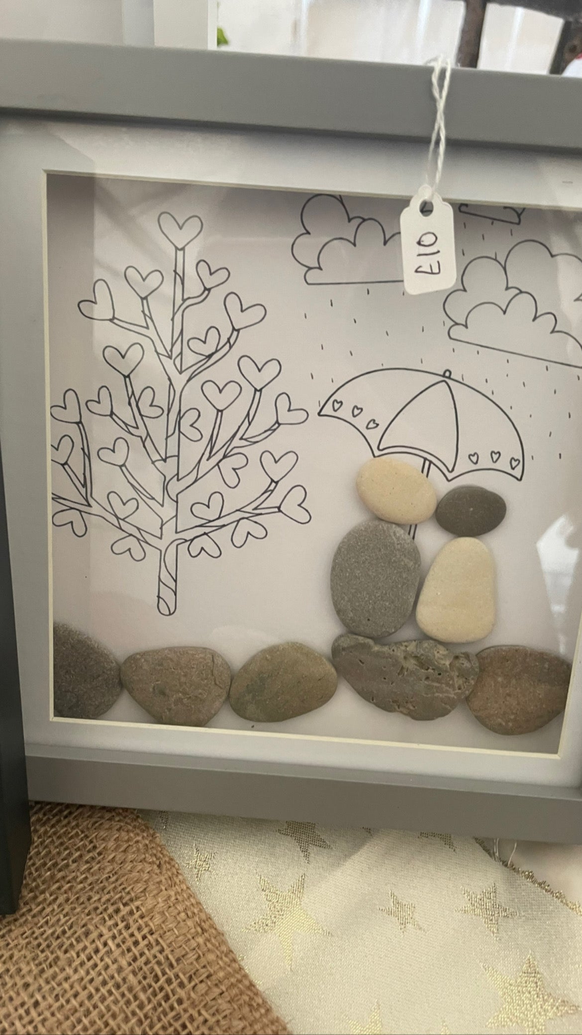Pebble art box frame. Couple umbrella