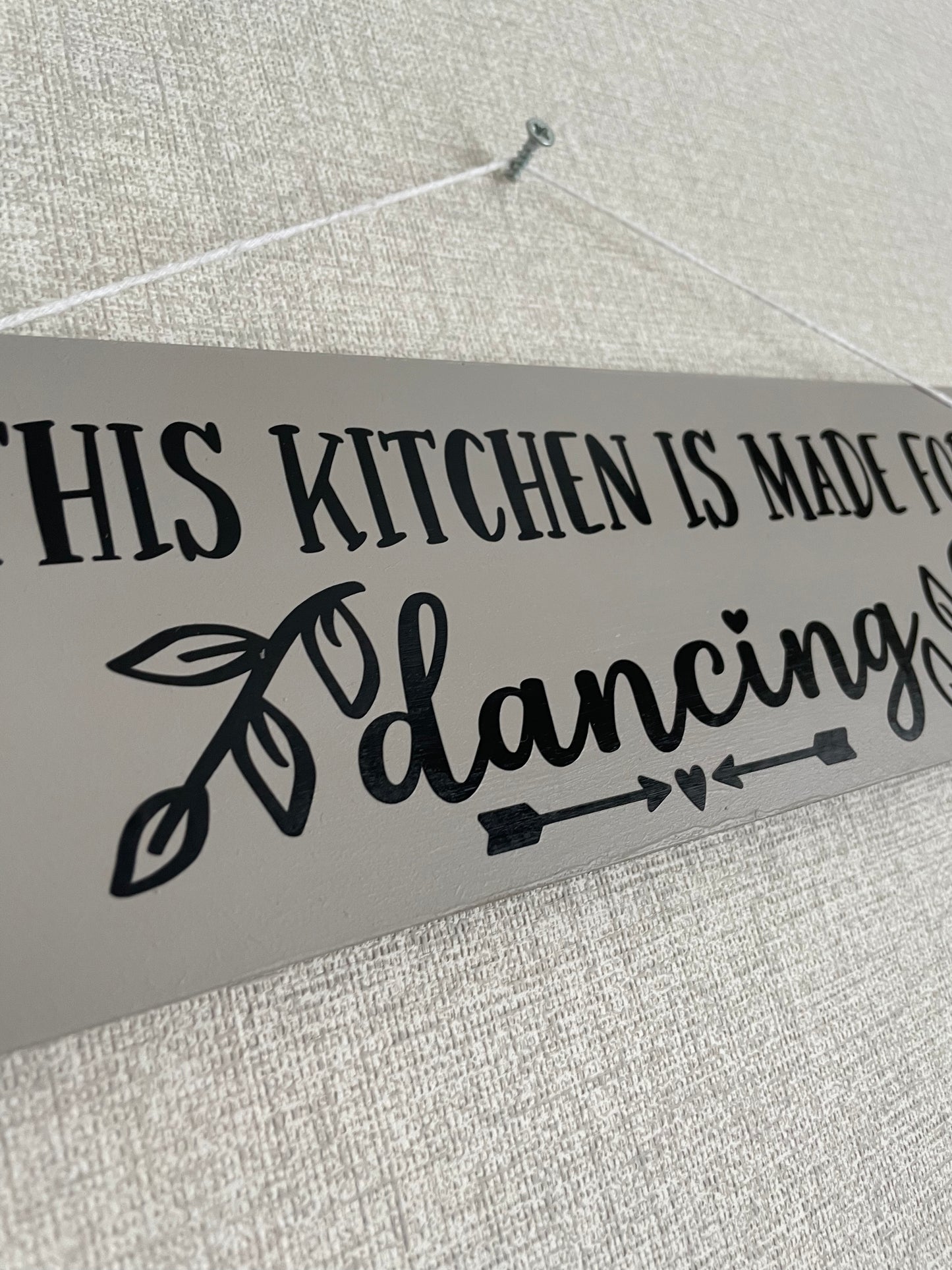 This kitchen is made for dancing wooden sign
